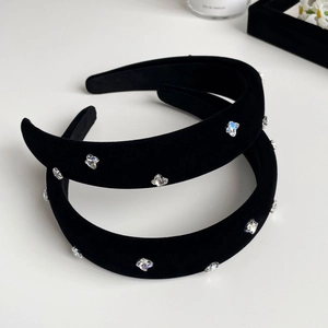 Elegant black velvet headband with sparkling crystal star embellishments and padded height