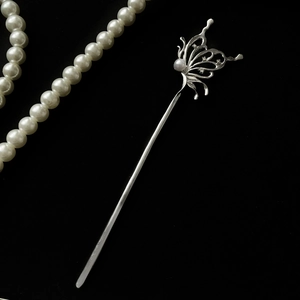 Elegant silver butterfly hair pin with pearl inlay and crystals in a New Chinese style