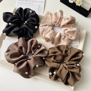 Set of four satin silk scrunchies with white pearls in black champagne and brown tones