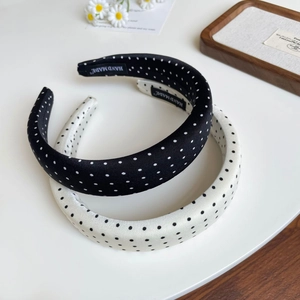 Elegant polka dot sponge headbands in black and white with a stylish handmade silk texture