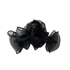 Pince à cheveux élégante avec nœud en organza noir pour chignons au design minimaliste