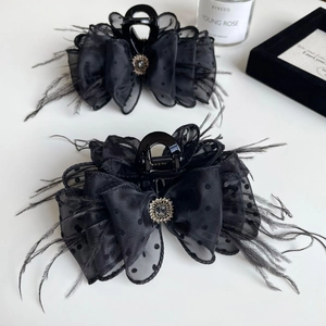 Elegant black feather and polka dot mesh hair claw clips with vintage rhinestones