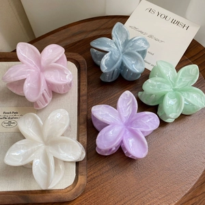 Set of 5 colorful marble-textured plumeria flower hair claws for sweet summer updos