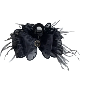 Elegant black feather and polka dot mesh hair claw clip with rhinestone detail