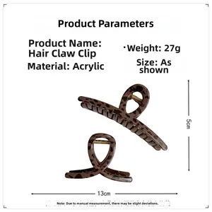 Macro view of leopard print hair claw clip showing 13cm length and acrylic material texture