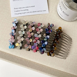 Set of 6 elegant floral hair combs with resin flower petals and sparkling crystal centers