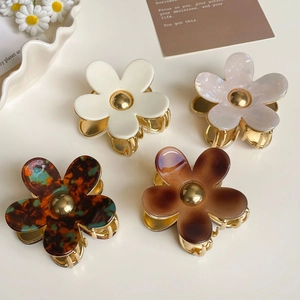 Lot de pinces à cheveux fleur en acétate coloris crème, nacre, écaille et ambre brun