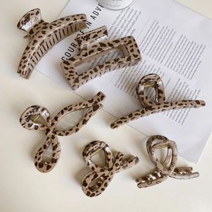 Classic leopard pattern hair claws collection featuring elegant tortoiseshell textures