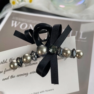 Pince à cheveux élégante en résine noire avec perles de cristal et nœud satin