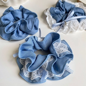 Three-piece set of light blue denim-style scrunchies with white lace and pearl detail