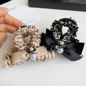 Elegant tweed hair claw clips with ribbon bows and pearl camellia accents for women