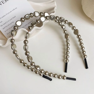Serre-têtes à billes argentées avec sphères métalliques pour un style moderne et minimaliste