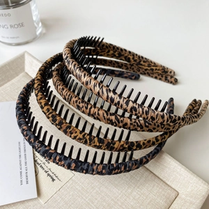 Set of four leopard print fabric headbands with anti-slip inner teeth for women