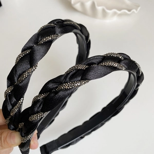 Set of two black braided satin headbands with sparkling rhinestones for women