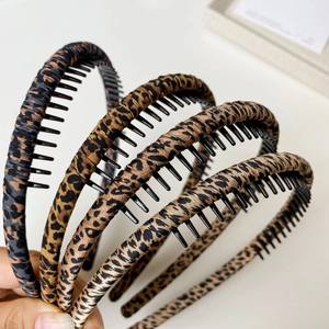 Set of four stylish leopard print fabric headbands with non-slip teeth for women