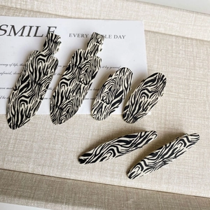 Set of 6 minimalist zebra pattern acetate hair clips for women in black and beige tones