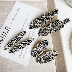 Chic zebra pattern hair clip set including geometric styles in a display tray