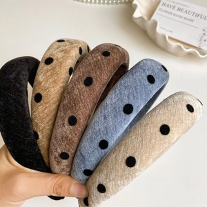 Detailed comparison of five velvet polka dot headbands in various vintage autumn colors