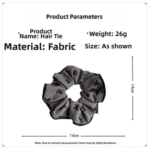 Detailed parameter chart for dark grey bow fabric scrunchie showing 14cm size and 26g weight
