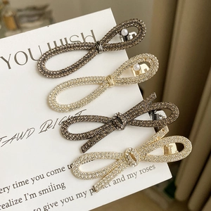 Barrettes à cheveux nœud élégantes avec strass scintillants en doré et argenté