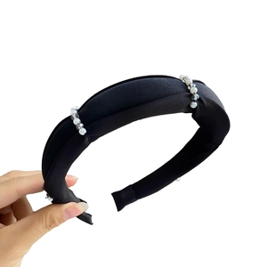 Elegant black satin padded headband with white pearls and clear crystal beads for women