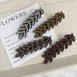 Set of four wheat ear hair clips with sparkling rhinestones in assorted elegant colors
