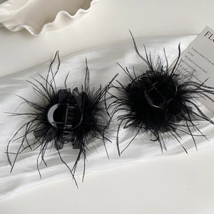 Elegant black feather hair claw clips with fluffy ostrich feathers and sheer mesh bows