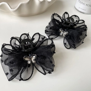 Elegant black mesh polka dot bow hair claw clip with rhinestone butterfly detail