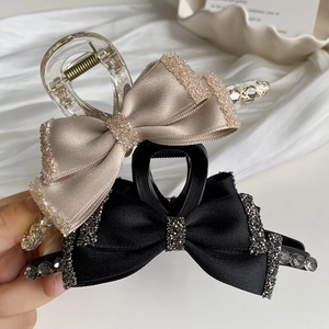 Elegant French vintage satin bow hair claw clips with rhinestone edges in beige and black
