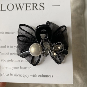 Elegant black mesh bow hair claw clip with pearl and rhinestone butterfly details