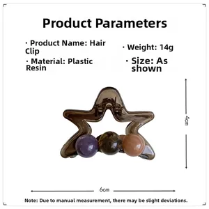 Detailansicht einer Haarspange in Sternform mit bunten Perlen und Harzkörper