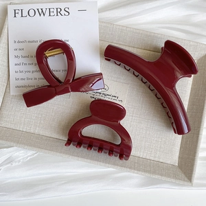 Three-piece set of glossy wine red hair claws including butterfly and arc designs