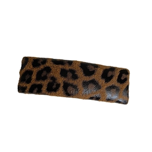 Chic leopard print eyewear case with soft textured faux fur finish on a white background