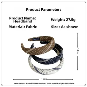 Detailed view of three striped knit headbands with hand made label and size dimensions