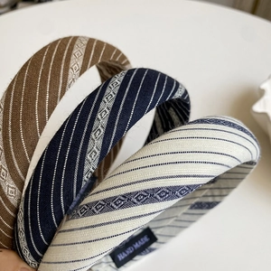 Three vintage padded striped headbands in brown, navy and cream with handmade label