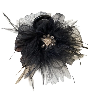 Elegant 8cm black feather and mesh hair claw clip with a sparkling crystal flower center
