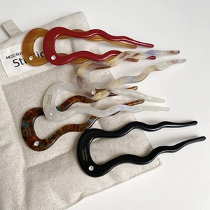 U-shaped wave acetate hair pins in multiple colors with single diamond inlay