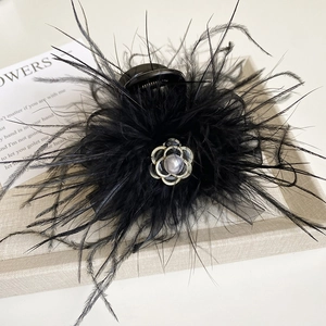 Elegant black feather hair claw clip with camellia flower and pearl for women's hairstyle