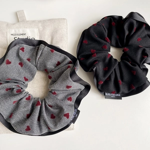 Polka dot heart scrunchies in black and grey colors with embroidered patterns