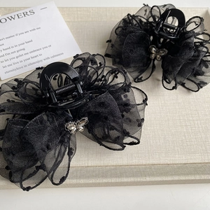 Elegant black mesh bow hair claw clips with rhinestone butterfly accent in two-piece set