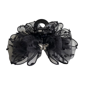 Elegant black tulle bow hair claw with polka dots and sparkling rhinestone butterfly motif