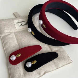 Elegant velvet pearl headbands and clips set in burgundy and black with gold accents