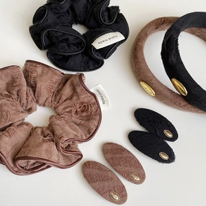 Vintage fabric hair accessories set with gold labels including scrunchies and BB hair clips