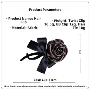Detail view of leopard print fabric flower hair clip with dimensions 11cm by 5cm