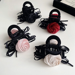 Elegant 3D rose hair claw clips with velvet bows in black, red, pink, and beige