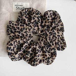 Vintage leopard print scrunchie in brown and black chiffon with elegant pleated design