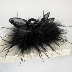 Gothic style black feather hair claw clip with mesh polka dot butterfly wings