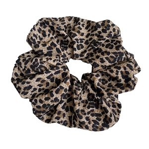 Vintage leopard print scrunchie in brown and black soft fabric for women