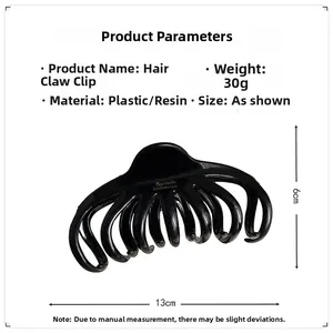 Detailed view of black hair claw clip with measurements showing 13cm length and 6cm height