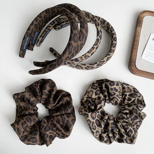 Classic leopard print fabric headband and scrunchie set for elegant hair styling